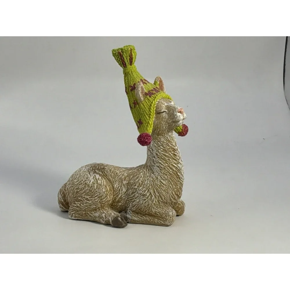 Cute Llama Wearing A Bright Green Stocking Cap Hat